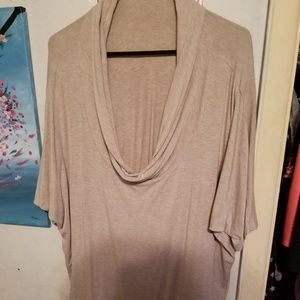 Tan loose turtleneck blouse